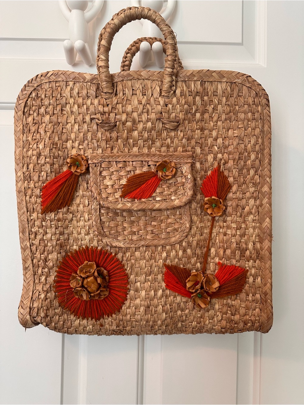 Woven Straw Tote Bag with Red Floral Embellishments